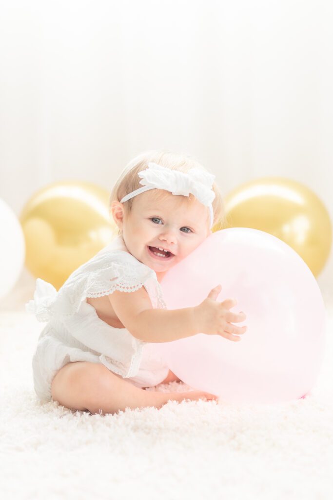 milestone session of baby girl for her 1st birthday, documented by Brooke Leigh Photographer at Studio Neue taken by Plymouth Michigan Newborn Photographer