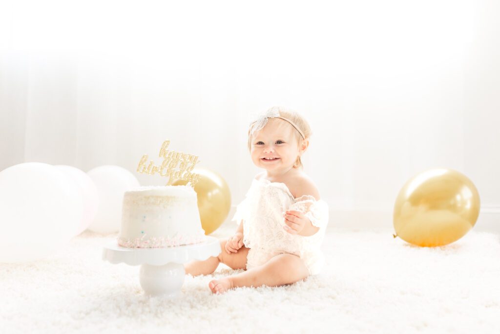 Plymouth Michigan Newborn Photographer captures Cake smash session to document 1st birthday milestone session, documented by Brooke Leigh Photographer at Studio Neue