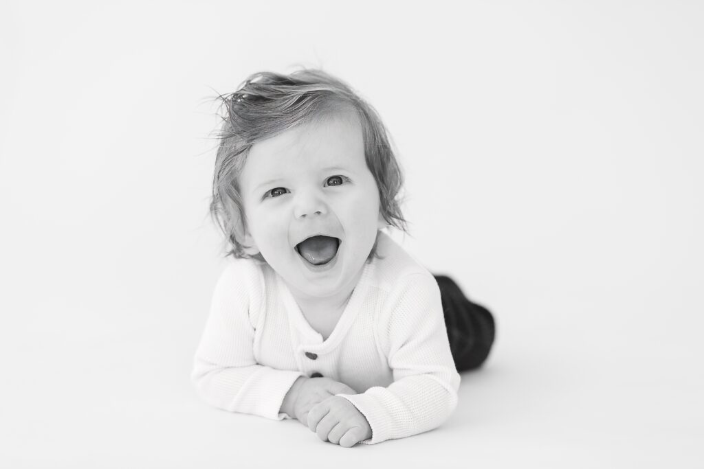 Baby boy is all smiles at Studio Neue in Plymouth Michigan for his mini session 