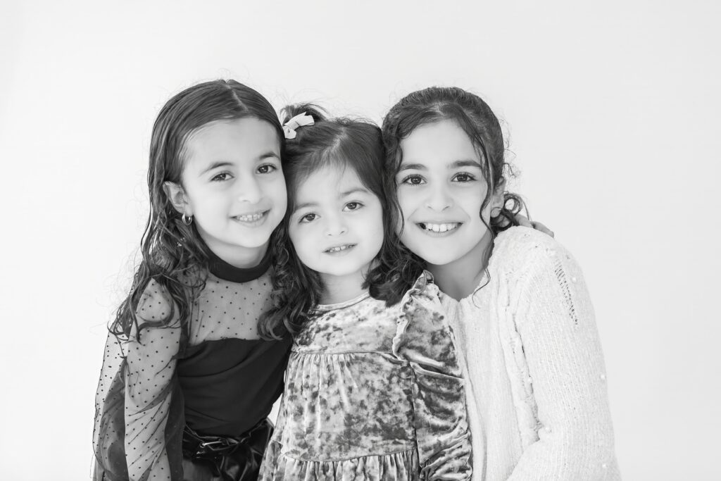 Sisters join together for personality mini sessions at Studio Neue in Plymouth Michigan to benefit Middle Eastern Families.  Fundraiser hosted by Plymouth Michigan Newborn Photographer Brooke Leigh Photography