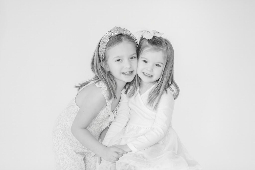 Sisters at Studio Neue in Plymouth Michigan for Personality Mini Sessions put on by Brooke Leigh Photography, Plymouth Michigan Newborn Photographer