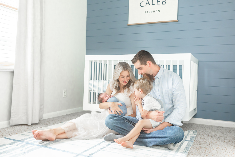 In home newborn session in Canton Michigan, family photo in nursery taken by Brooke Leigh Photography